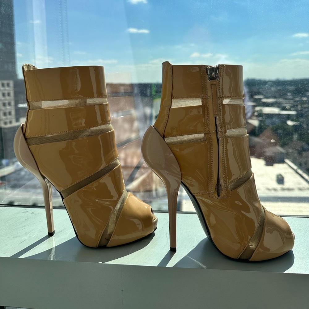 Beige Giuseppe booties size 5.. mesh in between the patent leather. True to size